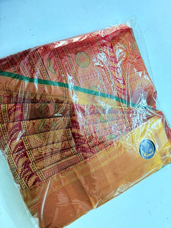 Neatly pre-pleated silk saree, folded and ready for delivery